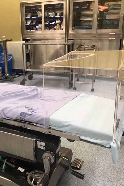 Medical sneeze guard for patients at a hospital